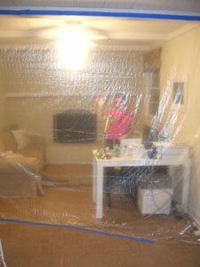 Using Plastic Tarps During Renovation To Keep Dust Out