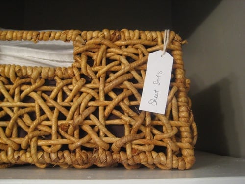 How To Add Small Cardstock Tags To Bathroom Storage Baskets