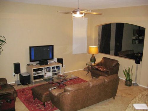 Neutral Living Room With A Leather Sofa & Dark Wood Furniture
