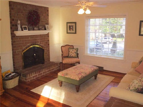 A Brick Fireplace Makeover With Tumbled Marble