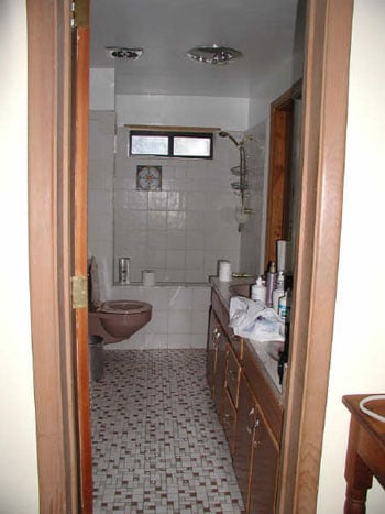 Using A Wire Basket To Store Toilet Paper