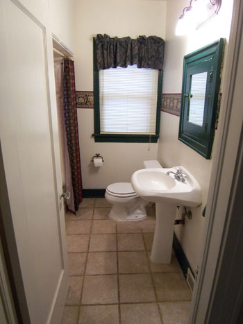 A Neutral Bathroom With Classic Basketweave Tile
