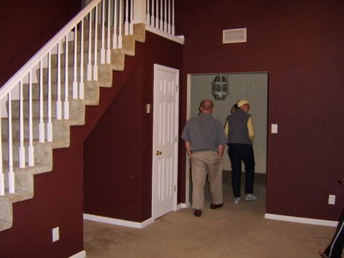 Priming And Painting Dark Red Walls To Lighten Things Up