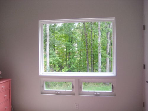 How To Hang Curtains So The Window Looks Bigger