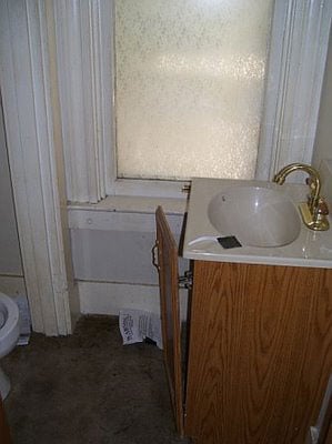 A Small Bathroom Makeover With A Crystal Chandelier