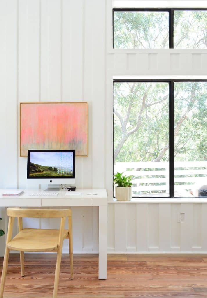 Beachy Living Room With Office Area And White Planked Walls