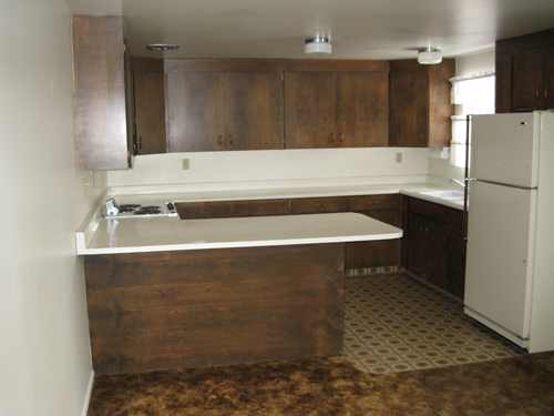 Ripping Up Carpet And Renovating A White Kitchen