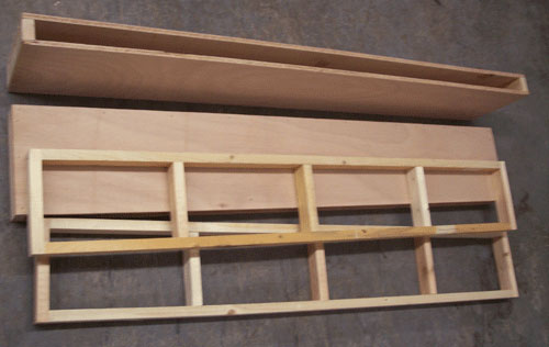 Photo of two frame pieces and two shelf boxes for DIY floating shelf project
