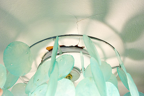 Covering Drywall Cracks With A Ceiling Medallion