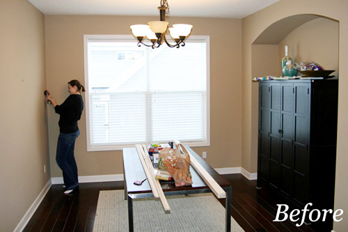 A Dining Room With Board & Batten And Dark Blue Walls