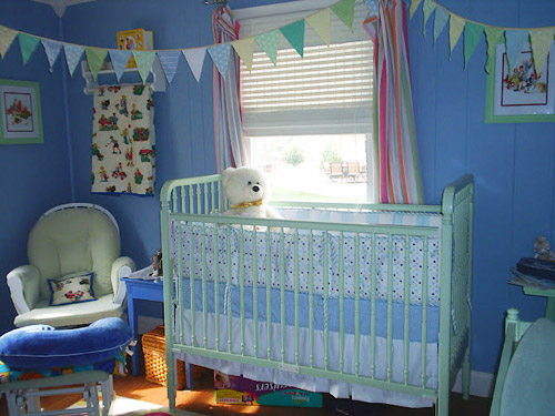 A Boy’s Bedroom With A Wood Plank Ceiling & Checkered Curtains