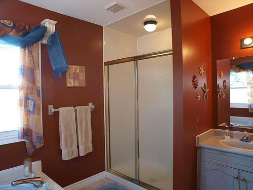 A Dreamy White & Gray Bathroom With Box Molding