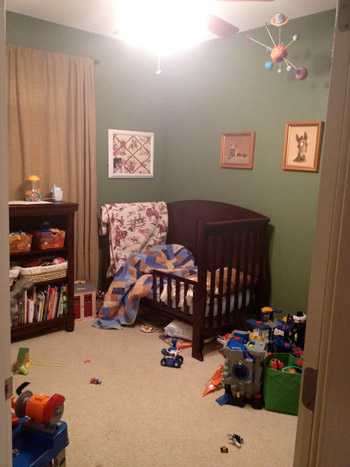 An Amazing Big Boy Room With Patterned Wallpaper