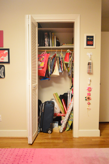 A Kids Closet With Some Play Space In It