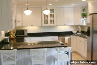 Tearing Out Carpet to Renovate a White Kitchen