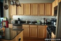 DIY Stainless Steel Stick-On Backsplash for $100