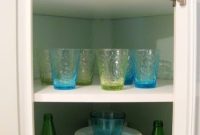 How to Paint the Back Panel of a Glass Kitchen Cabinet