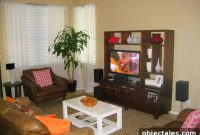 Neutral Living Room Ideas: Leather Sofa and Dark Wood Accents