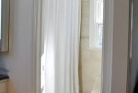 How to Hang a Shower Curtain Higher Without Replacing the Rod