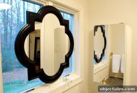 How to Hang a Bathroom Mirror in Front of a Window