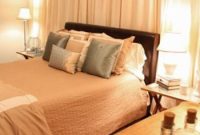 Bedroom Makeover with Curtained Closets Flanking the Bed