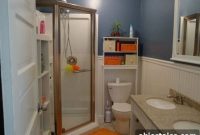 Dark Blue Bathroom Design with Corner Shower