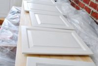 How We Painted Wood Cabinets with Benjamin Moore Cloud Cover