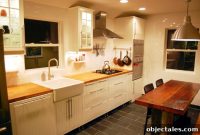White Kitchen with Butcher Block Counter and Apron Sink