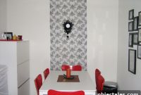 Transform Your Kitchen with Red Chairs and a Fabric Accent Wall