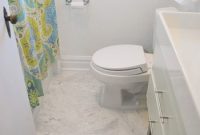 Small Bathroom Refresh with Teal Glass Tile
