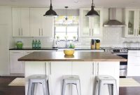 White Kitchen Makeover with White Tile and Butcher Block Island