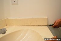 How to Remove an Outdated Bathroom Vanity Backsplash