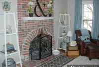 Family Room with Brick Fireplace and Blue Curtains