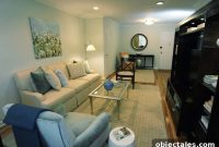 Pale Blue Living Room Makeover: Styling with a Tan Rug