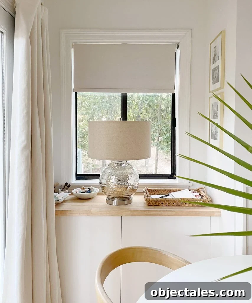 Install Smart Motorized Blinds: Step-by-Step Guide 2 Smart Roller Shades Behind Lamp In Bedroom Halfway Lowered