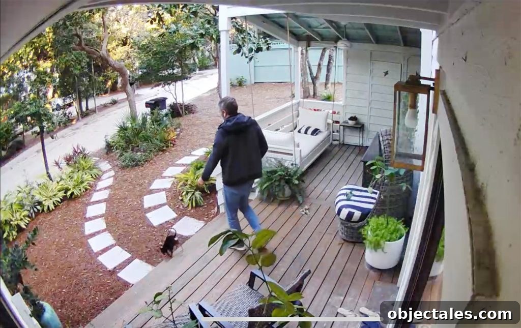 Security Camera Footage of Front Porch With John Walking Penny