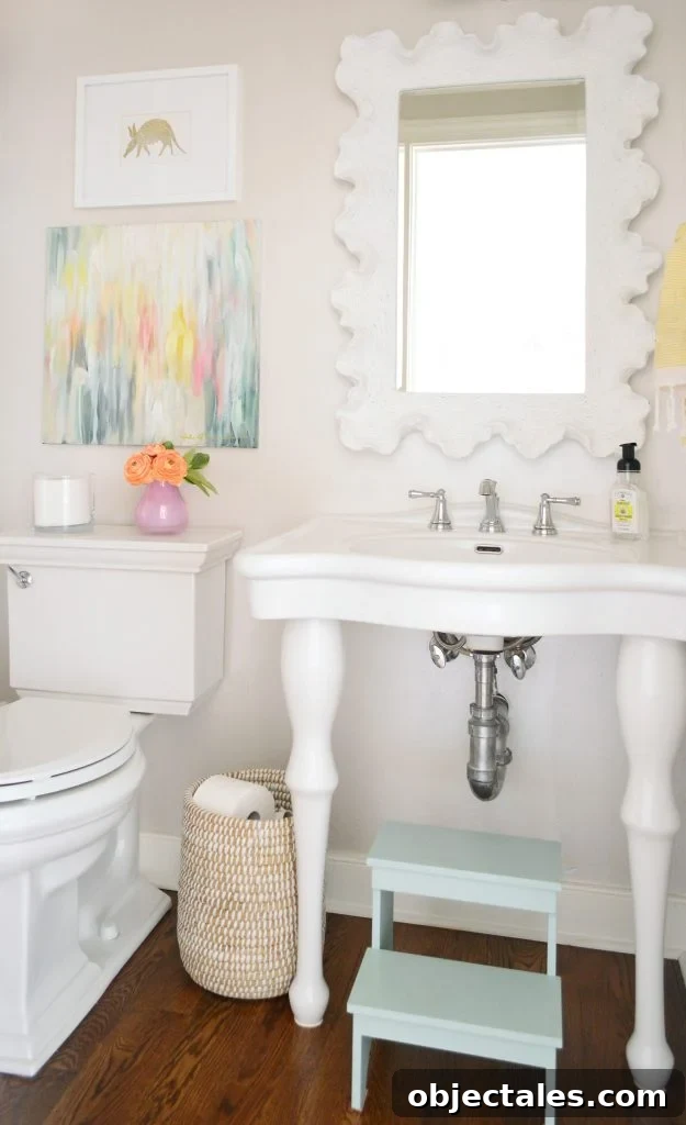 Which Toilet We Recommend: Our Favorite Model Revealed 3 Powder room with sink on legs and traditional Kohler Memoirs Toilet