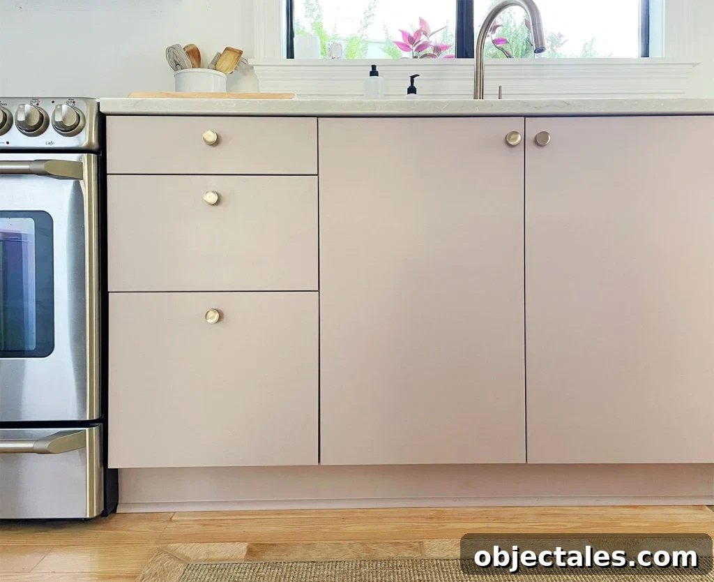 Mauve Painted Ikea VEDDIGNE Cabinets With Brass Hardware Detail