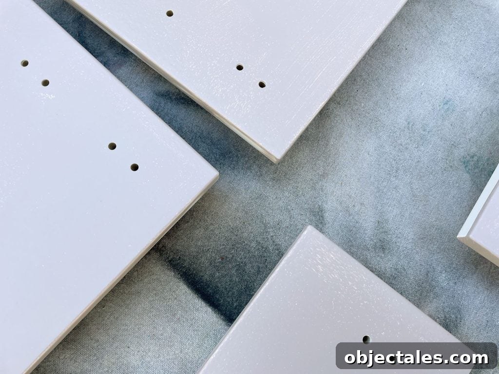 Close Up On Patching First Coat Of Painted Ikea Cabinet Fronts