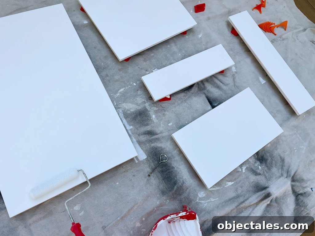 Applying Primer To Ikea Kitchen Cabinet Doors With Foam Roller