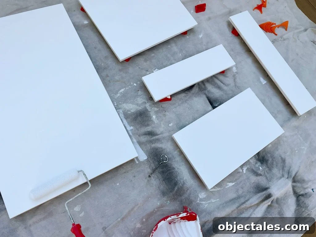 Applying Primer To Ikea Kitchen Cabinet Doors With Foam Roller