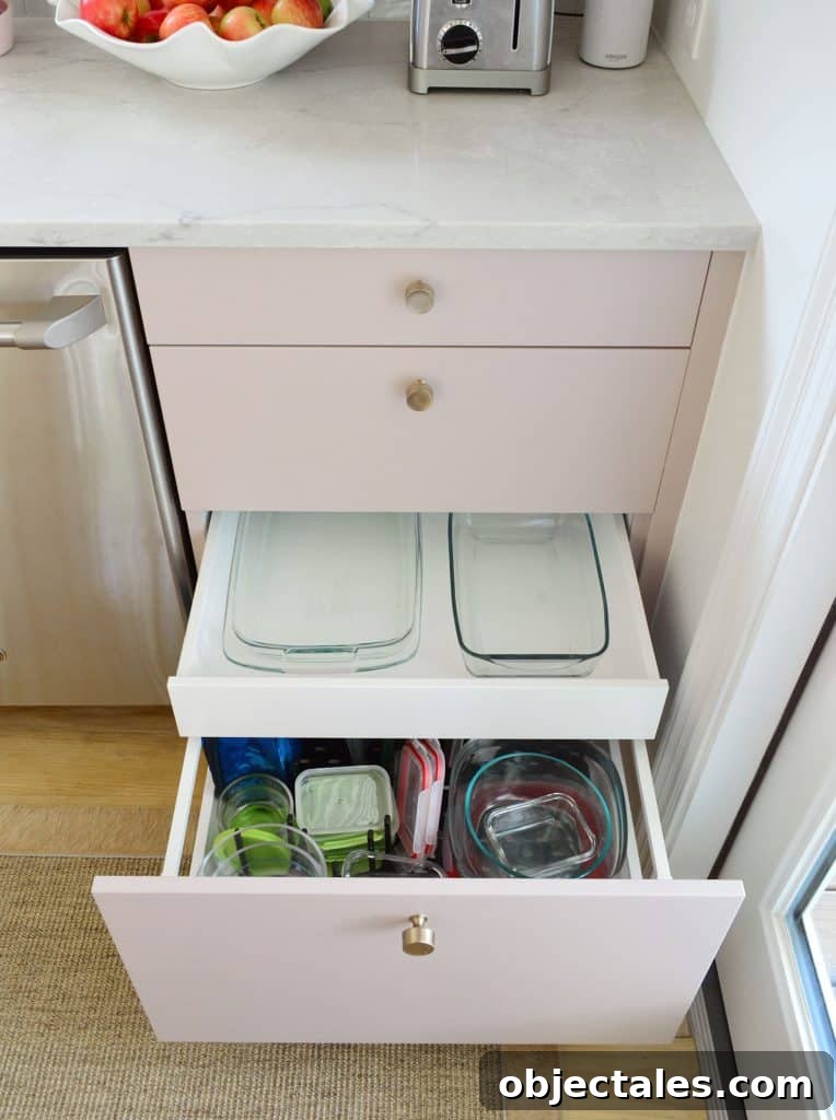 Small IKEA Kitchen Storage and Organization Ideas 10 Hidden Drawer In Ikea Kitchen With Glass Bakeware