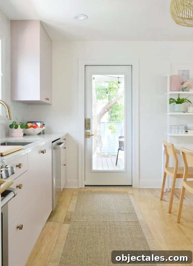 Small IKEA Kitchen Storage and Organization Ideas 6 View Towards Kitchen Porch Door In Painted Mauve Pink Ikea Kitchen With Jute Runner