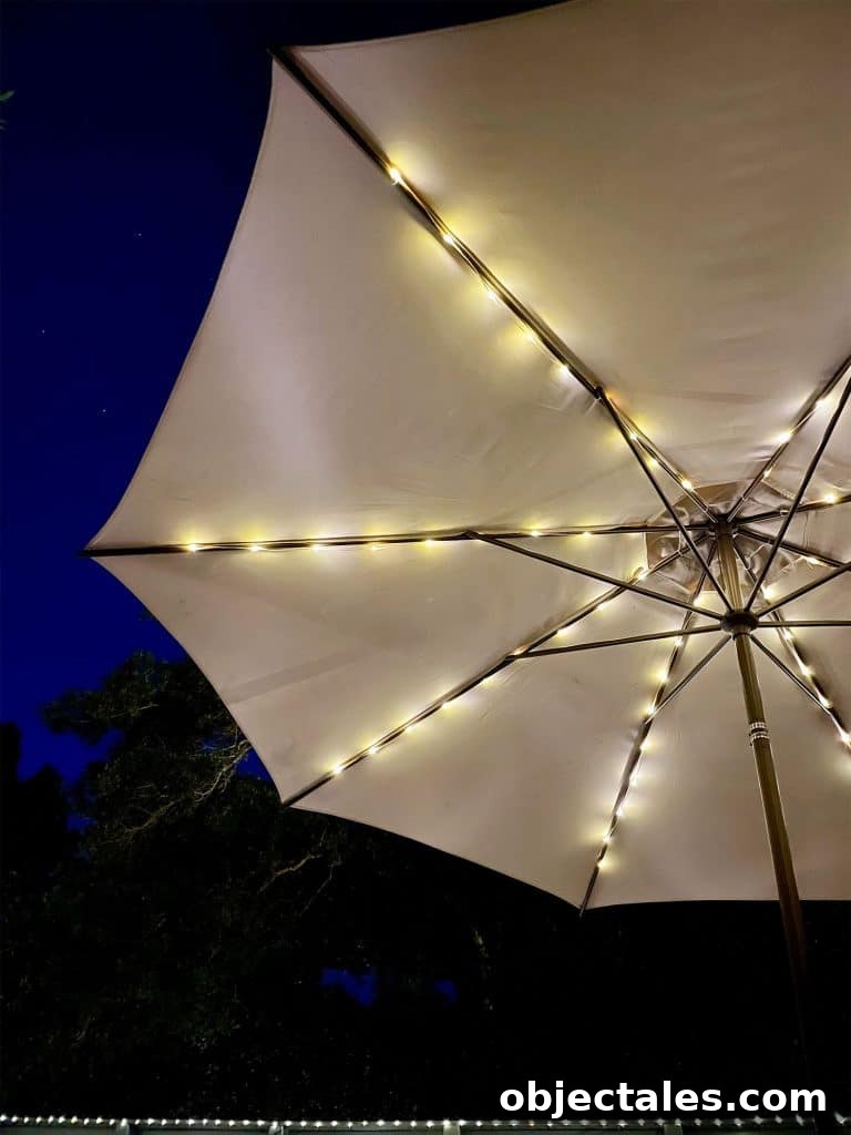 Top Outdoor Solar Lights for Brighter Yards and Patios 12 Underside Of Patio Umbrella With Solar LED Lights At Night