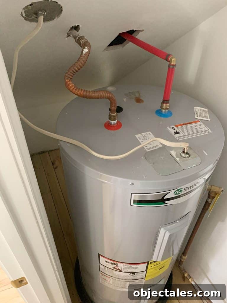 Utility Closet Storage Ideas to Maximize Space 6 Before Photo Of Large Electric Water Heater Tank In Utility Closet