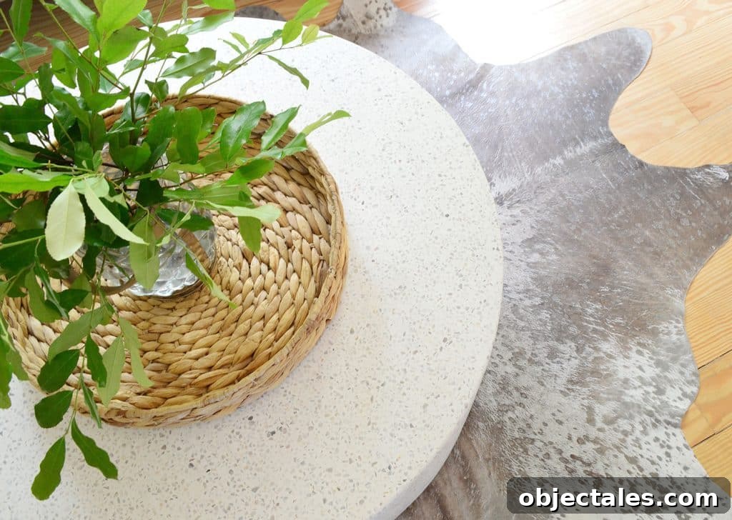 Overhead View Of Terrazzo Coffee Table On Metallic Cowhide Rug