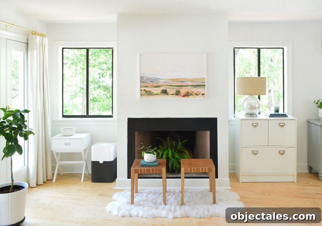 Bedroom fireplace shortly after moving with random furniture along the wall