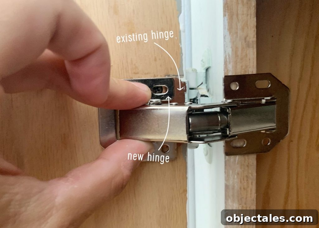 Diagram of marking holes for new hidden hinges over existing hinge