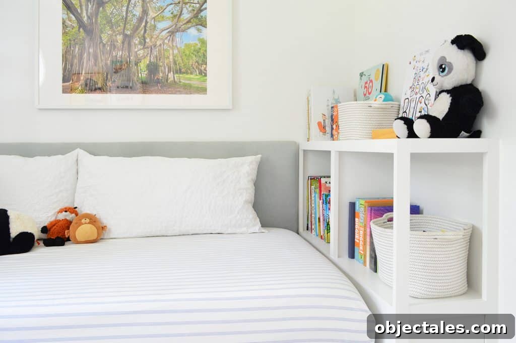 DIY Bookshelf: Step-by-Step Build Guide 11 After photo of built-in bookcase at foot of bed with books and stuffed animals