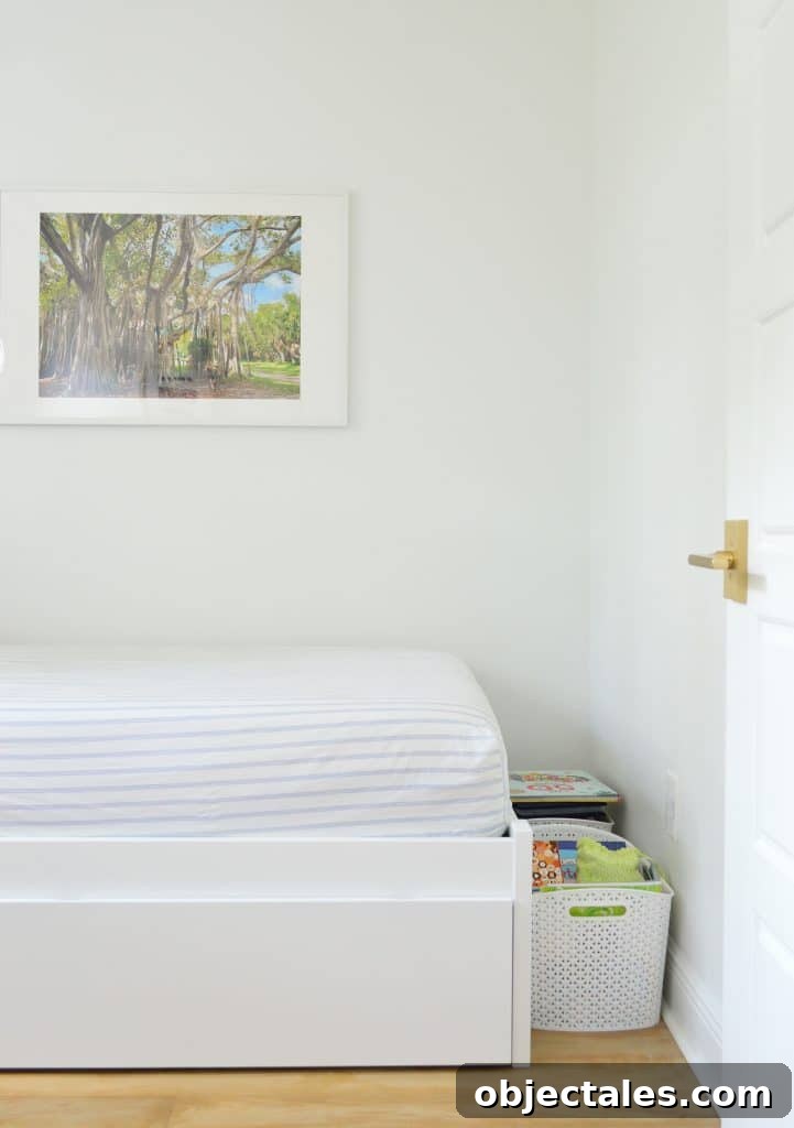 DIY Bookshelf: Step-by-Step Build Guide 3 Before photo of boys bedroom with baskets on the floor near foot of bed